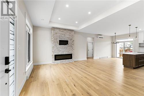 60 Guy, Shediac, NB - Indoor Photo Showing Other Room With Fireplace