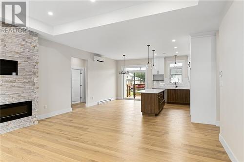 60 Guy, Shediac, NB - Indoor Photo Showing Living Room With Fireplace