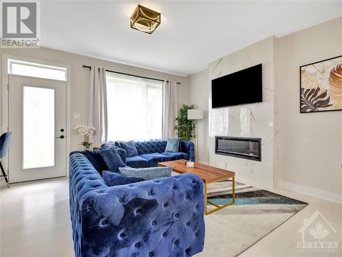 2007 Elevation Road, Ottawa, ON - Indoor Photo Showing Living Room With Fireplace