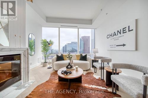 5005 - 180 University Avenue, Toronto (Bay Street Corridor), ON - Indoor Photo Showing Living Room With Fireplace