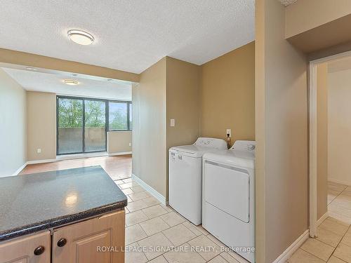 535-665 Kennedy Rd, Toronto, ON - Indoor Photo Showing Laundry Room