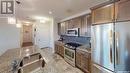 307 1715 Badham Boulevard, Regina, SK  - Indoor Photo Showing Kitchen With Upgraded Kitchen 