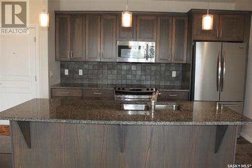 307 1715 Badham Boulevard, Regina, SK - Indoor Photo Showing Kitchen With Double Sink With Upgraded Kitchen