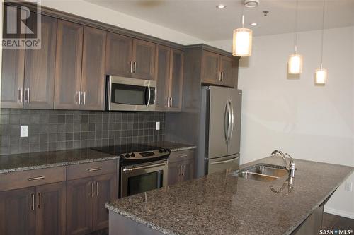 307 1715 Badham Boulevard, Regina, SK - Indoor Photo Showing Kitchen With Double Sink With Upgraded Kitchen