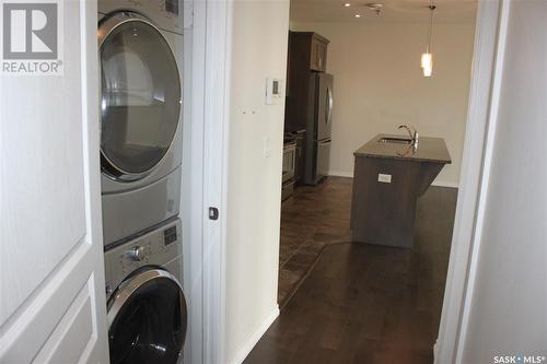 307 1715 Badham Boulevard, Regina, SK - Indoor Photo Showing Laundry Room