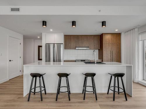 Cuisine - 701-700 Route Des Rivières, Lévis (Les Chutes-De-La-Chaudière-Ouest), QC - Indoor Photo Showing Kitchen With Upgraded Kitchen