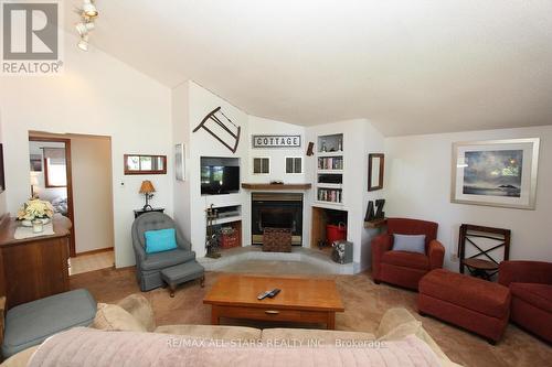 54 Laxton Twp 5Th Line, Kawartha Lakes, ON - Indoor Photo Showing Living Room With Fireplace