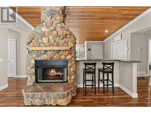 38 West Poirier Road, Sicamous, BC - Indoor Photo Showing Living Room With Fireplace