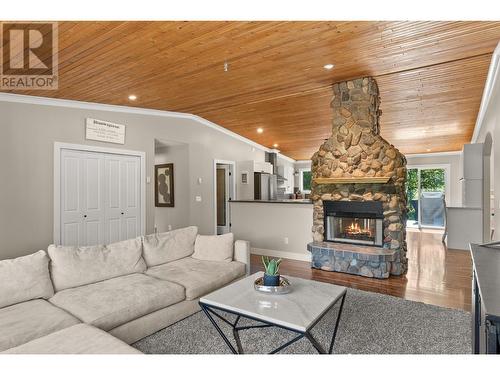 38 West Poirier Road, Sicamous, BC - Indoor Photo Showing Living Room With Fireplace