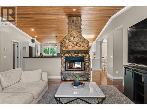 38 West Poirier Road, Sicamous, BC - Indoor Photo Showing Living Room With Fireplace