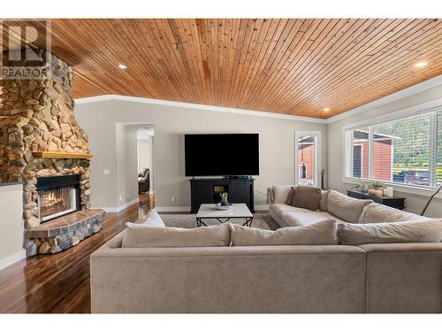 38 West Poirier Road, Sicamous, BC - Indoor Photo Showing Living Room With Fireplace