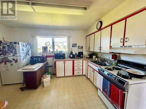 921 91A Avenue, Dawson Creek, BC - Indoor Photo Showing Kitchen With Double Sink