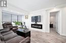 1601 - 7601 Bathurst Street, Vaughan, ON  - Indoor Photo Showing Living Room With Fireplace 