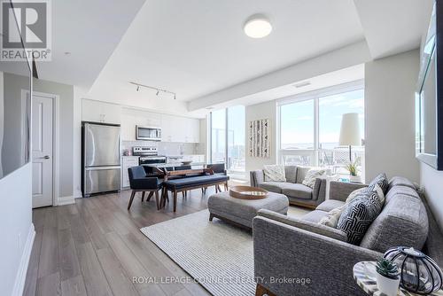 703 - 3121 Sheppard Avenue E, Toronto, ON - Indoor Photo Showing Living Room