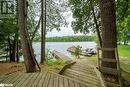 1117 A Twin Pine Lane, Cloyne, ON  - Outdoor With Body Of Water With Deck Patio Veranda 