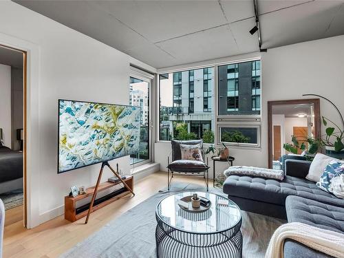 217-989 Johnson St, Victoria, BC - Indoor Photo Showing Living Room With Fireplace