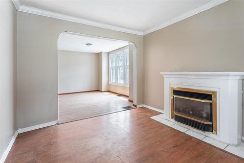 51 Cedar Avenue, Hamilton, ON - Indoor Photo Showing Living Room With Fireplace
