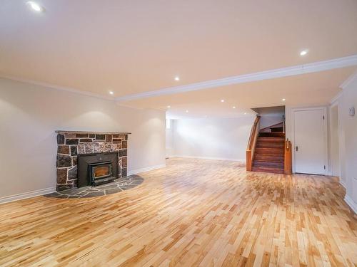 Sous-sol - 3 Av. Hazelwood, Montréal (Outremont), QC - Indoor Photo Showing Living Room With Fireplace