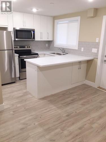 651 Braid Street Unit# 101, Penticton, BC - Indoor Photo Showing Kitchen With Double Sink