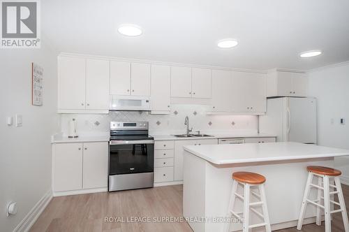 32 Cartwright Avenue, Toronto, ON - Indoor Photo Showing Kitchen With Double Sink