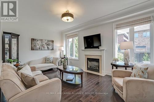 2245 Millstone Drive, Oakville, ON - Indoor Photo Showing Living Room With Fireplace