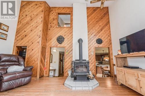 8633 30 Sideroad, Centre Wellington, ON - Indoor Photo Showing Living Room With Fireplace