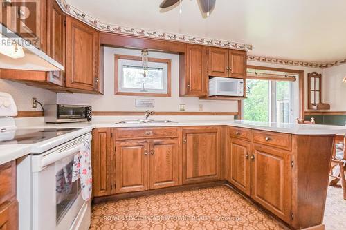 8633 30 Sideroad, Centre Wellington, ON - Indoor Photo Showing Kitchen With Double Sink