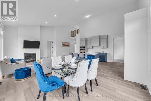 119 Sladden Court, Blue Mountains (Thornbury), ON - Indoor Photo Showing Dining Room With Fireplace