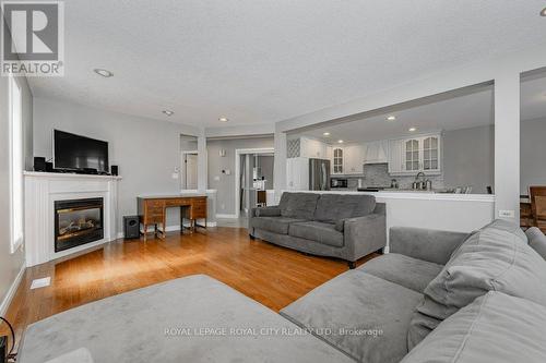 50 Clythe Creek Drive, Guelph, ON - Indoor Photo Showing Living Room With Fireplace