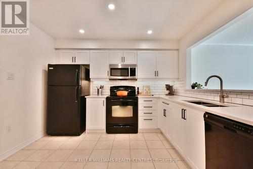 1018 Mississaga Street W, Orillia, ON - Indoor Photo Showing Kitchen With Double Sink