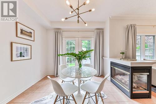 6 - 1576 Clarkson Road N, Mississauga (Clarkson), ON - Indoor Photo Showing Dining Room With Fireplace