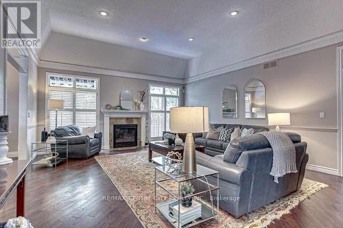 50 Exmoor Place, London, ON - Indoor Photo Showing Living Room With Fireplace