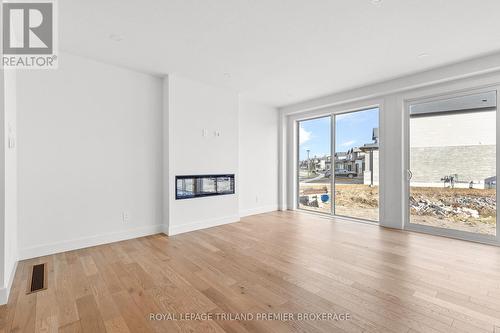 Lot 21 Dearing Drive, Lambton Shores (Grand Bend), ON - Indoor Photo Showing Living Room With Fireplace