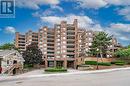 1104 - 100 Lakeshore Road E, Oakville, ON  - Outdoor With Balcony With Facade 