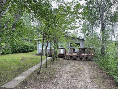 86 Higgins Lane, Onanole, MB - Outdoor With Deck Patio Veranda