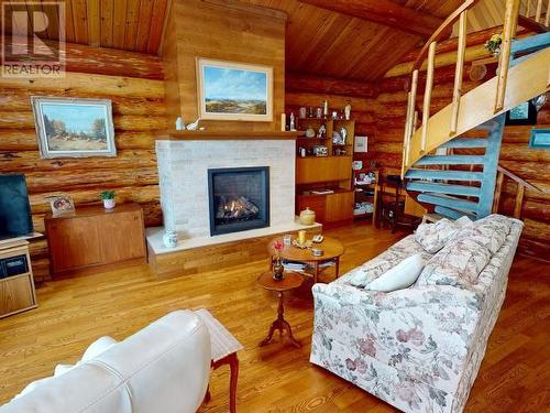 4304 Sanderson Road, Texada Island, BC - Indoor Photo Showing Living Room With Fireplace