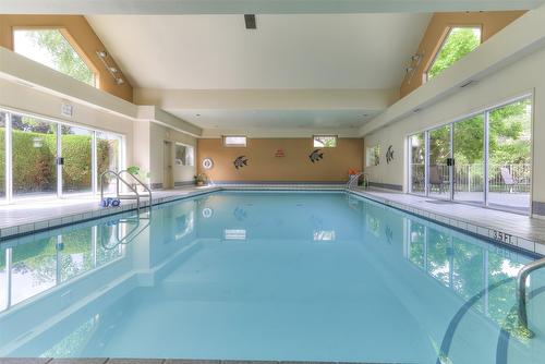108-650 Lexington Drive, Kelowna, BC - Indoor Photo Showing Other Room With In Ground Pool