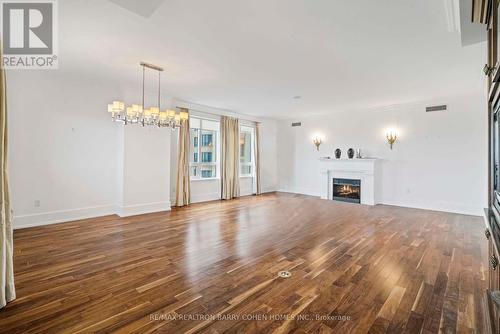 805C - 662 Sheppard Avenue E, Toronto C15, ON - Indoor Photo Showing Living Room With Fireplace