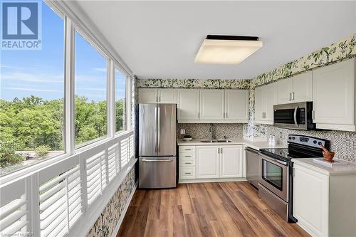 3 Towering Heights Boulevard Unit# 303, St. Catharines, ON - Indoor Photo Showing Kitchen With Stainless Steel Kitchen With Double Sink