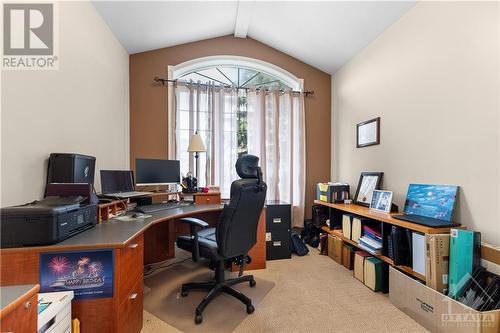 Den/office with vaulted ceiling and oversized window for abundant natural light. Add a murphy bed for your guests. - 470 Landswood Way, Ottawa, ON - Indoor Photo Showing Office