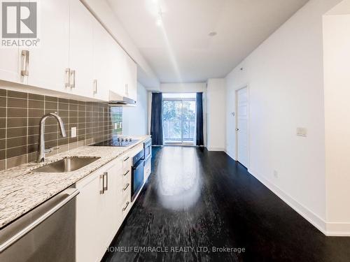 121 - 7 Kenaston Gardens, Toronto, ON - Indoor Photo Showing Kitchen