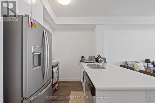 310 - 450 Dundas Street E, Hamilton, ON - Indoor Photo Showing Kitchen With Double Sink