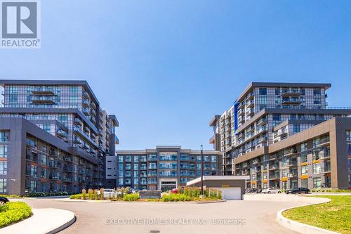 310 - 450 Dundas Street E, Hamilton, ON - Outdoor With Balcony With Facade