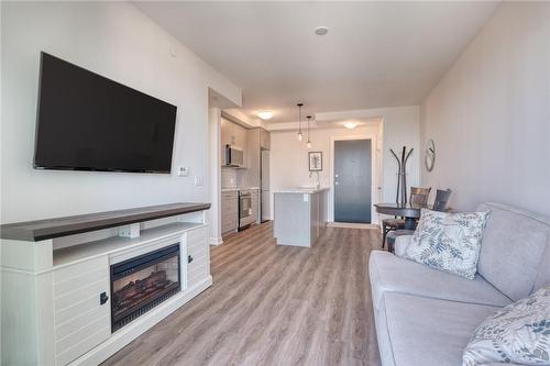 2750 King Street E|Unit #605, Hamilton, ON - Indoor Photo Showing Living Room With Fireplace