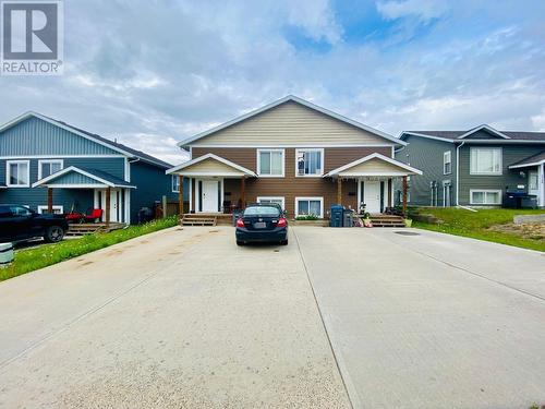 1708 & 1710 84 Avenue, Dawson Creek, BC - Outdoor With Facade