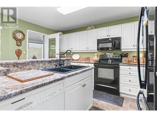 504 5 Street Lot# 27-72, Vernon, BC - Indoor Photo Showing Kitchen With Double Sink