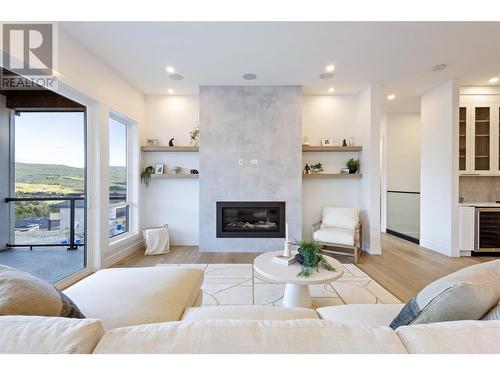 893 Loseth Drive, Kelowna, BC - Indoor Photo Showing Living Room With Fireplace