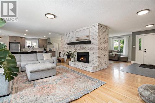 1102 Manotick Station Road, Ottawa, ON - Indoor Photo Showing Living Room With Fireplace