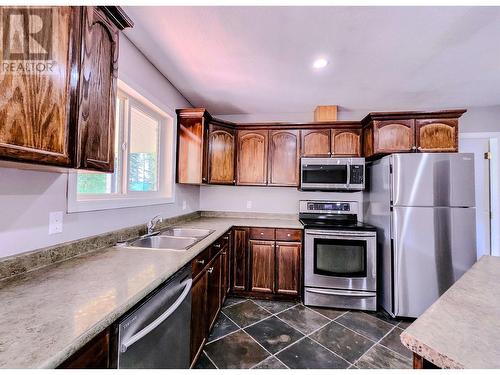 6017 Cedar Creek Road, Likely, BC - Indoor Photo Showing Kitchen With Double Sink