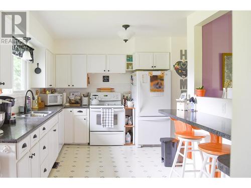 4438 Queensway Drive, Terrace, BC - Indoor Photo Showing Kitchen With Double Sink